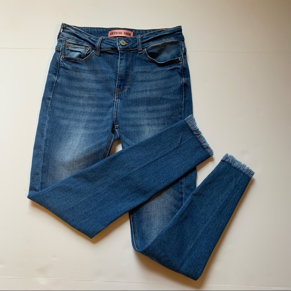 women’s blue jeans with chopped hem. Skinny
